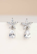 Radiant Bloom Platinum and Zircon Drop Earrings